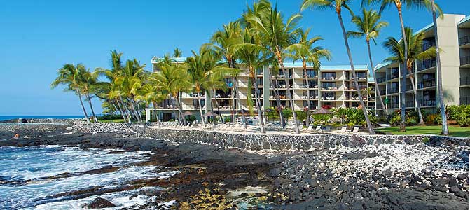 A large cruise ship sailing in the ocean.