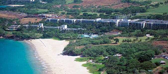 A large cruise ship sailing in the ocean.