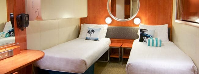 A large cruise ship sailing in the ocean.