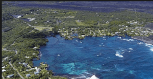 A large cruise ship sailing in the ocean.